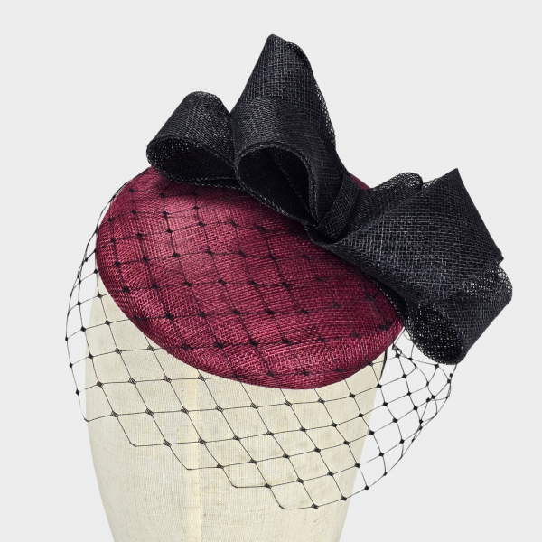 Burgundy and black veiled pillbox hat