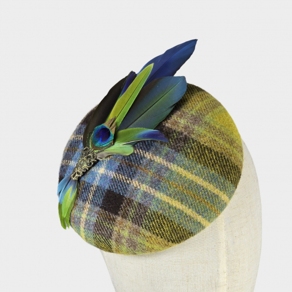 Checked wool pillbox hat with parrot feathers